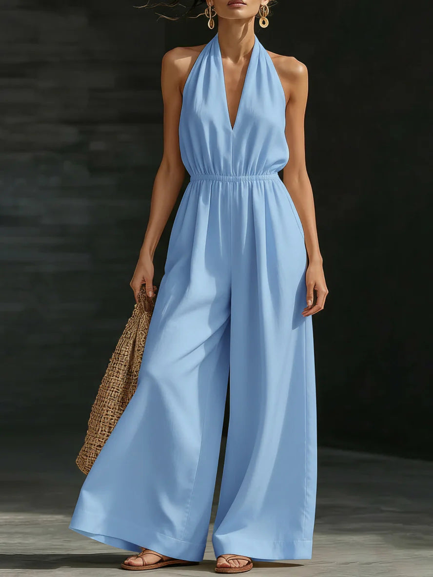 Elegant wide-leg jumpsuit featuring a lace overlay and adjustable halter tie, designed for women in soft, breathable fabric. 5