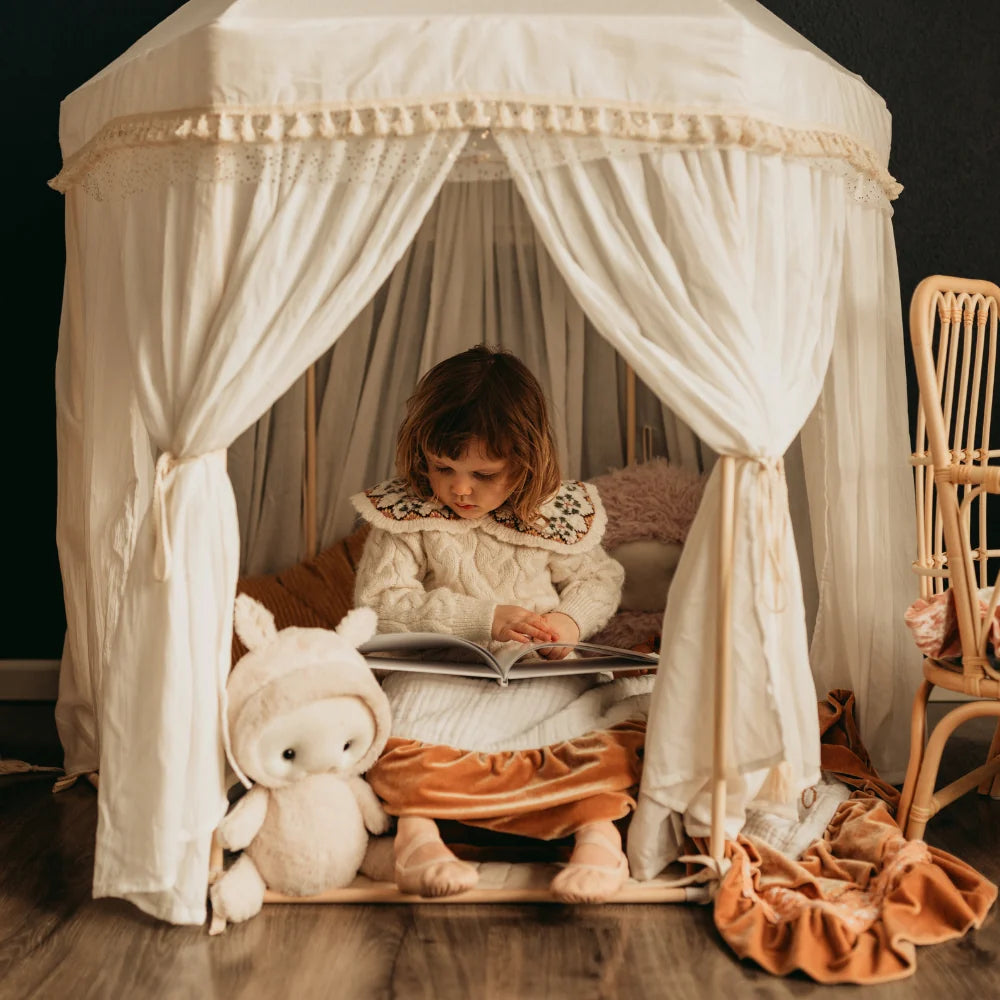 Kids play tent featuring roll-up walls and a sturdy wooden frame, designed in a Boho pavilion style with ecru cotton canvas, perfect for imaginative 3