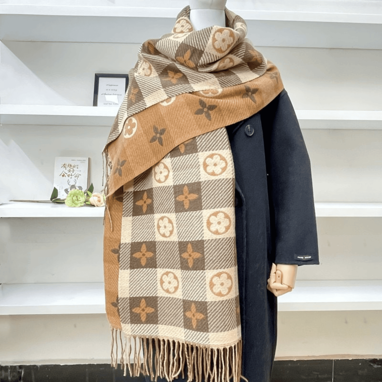 Reversible plaid scarf with tassels, featuring a lightweight and cozy design, made from a soft fabric blend, perfect for winter styling. 10