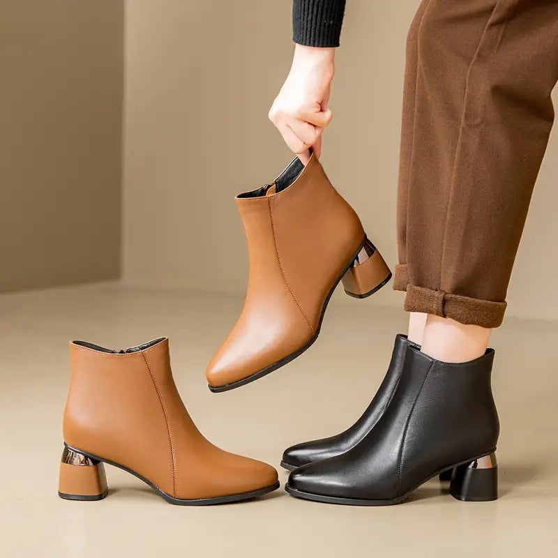 Women's ankle boots featuring a sleek black design and supportive sole, perfect for everyday comfort and style. 4