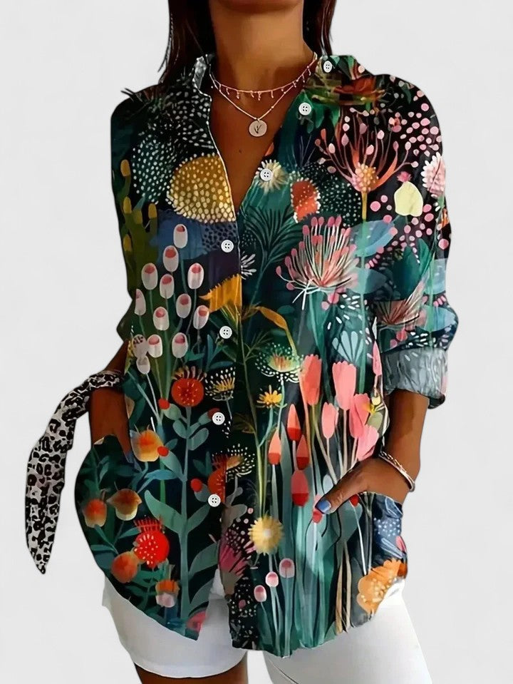 Women's button-up blouse featuring an artistic print, designed for versatility and elegance, perfect for both casual and formal occasions. 5