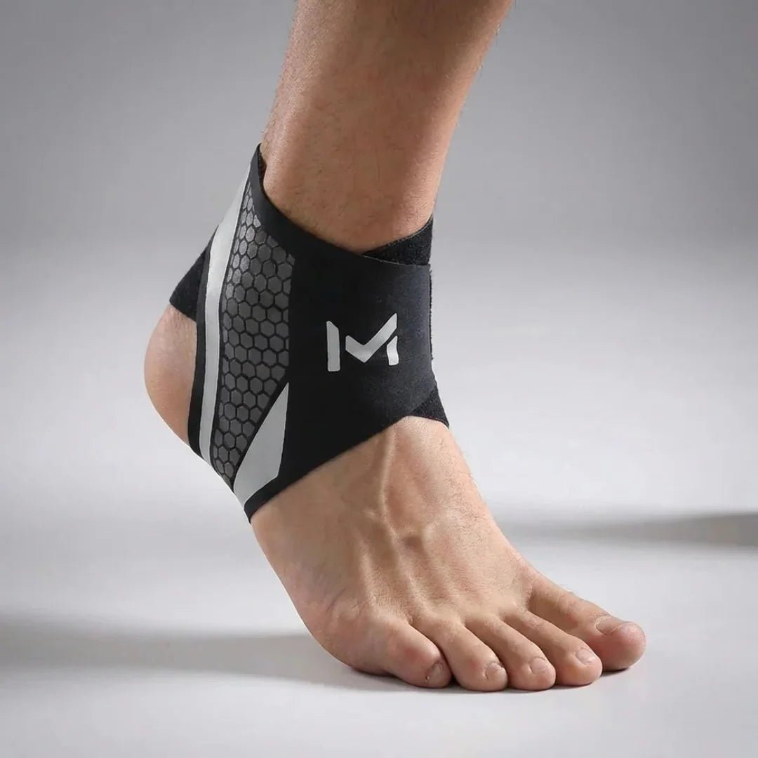Adjustable ankle support sleeve made from flexible nylon blend, designed for targeted compression, ideal for sports and physical activities. 12