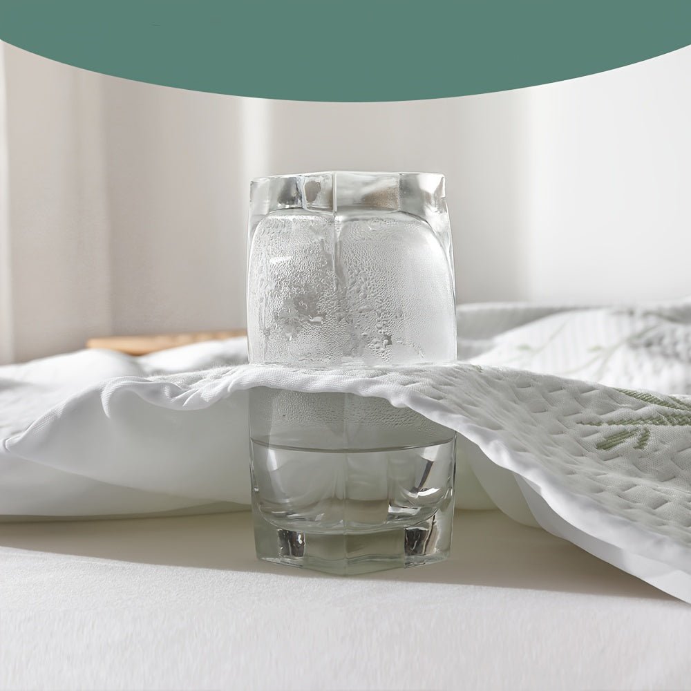Bamboo mattress protector featuring a cooling 3D air layer, designed for breathable and durable bedding, suitable for queen and king mattresses. 7