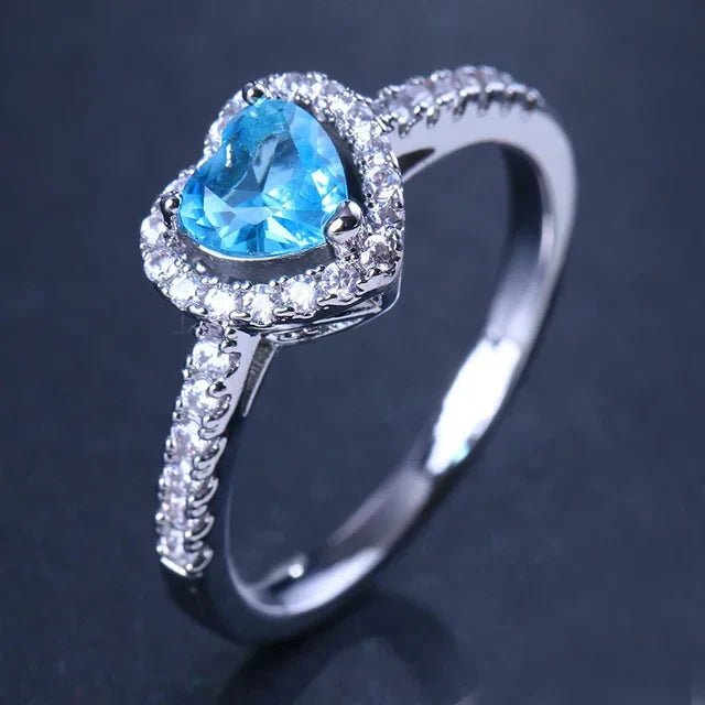 Heart-shaped diamond engagement ring crafted from 925 silver, symbolizing classic love, available in sizes 5-9. 14