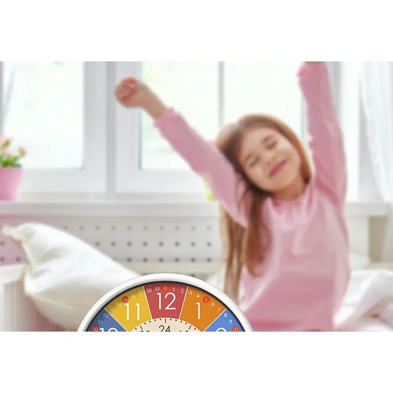 Interactive alarm clock for kids featuring a colorful PVC design and educational time-telling functions, promoting learning and engagement. 2