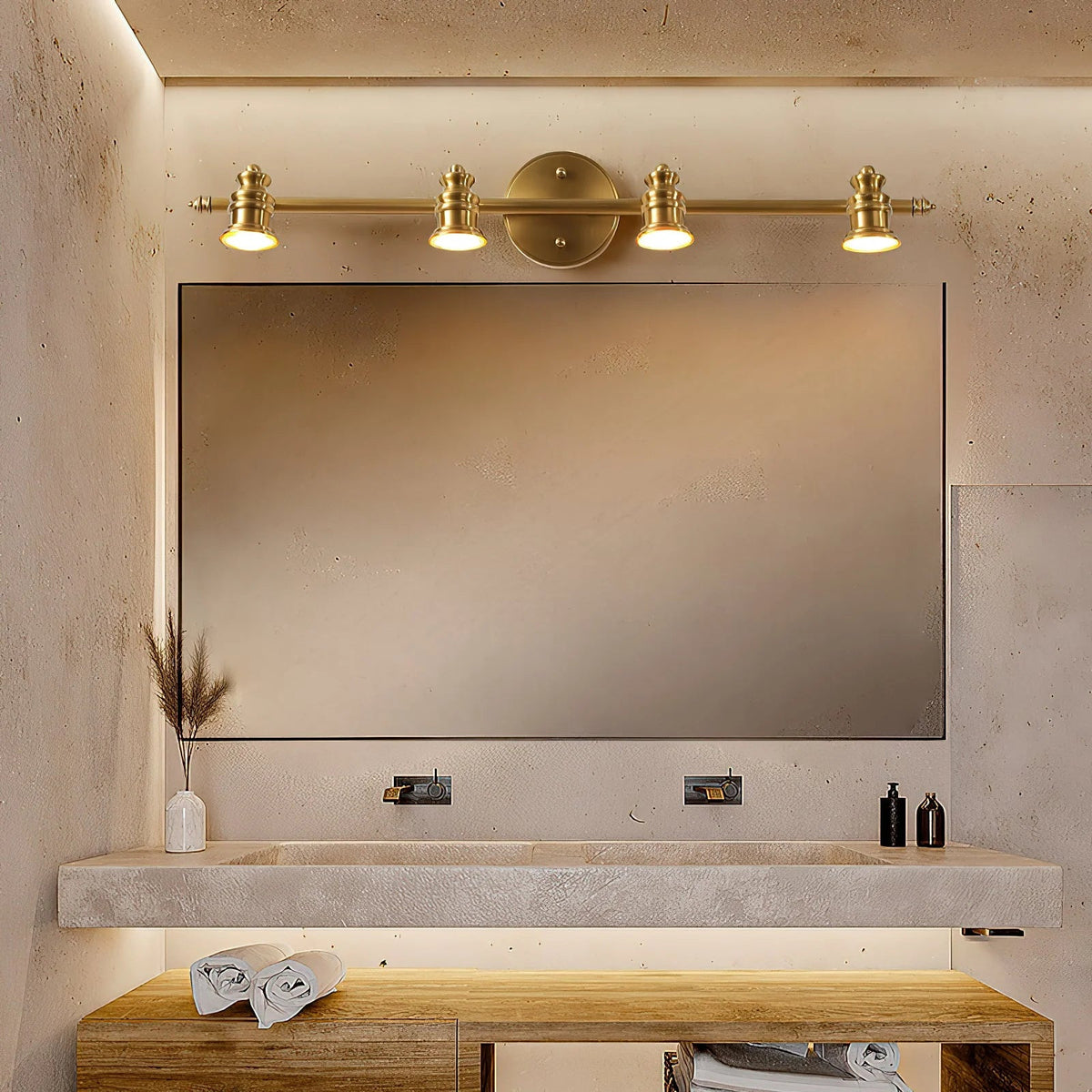 Linear wall light featuring adjustable spotlight heads in a warm brass finish, perfect for bathroom and indoor use, enhancing modern decor and providing focused illumination. 3