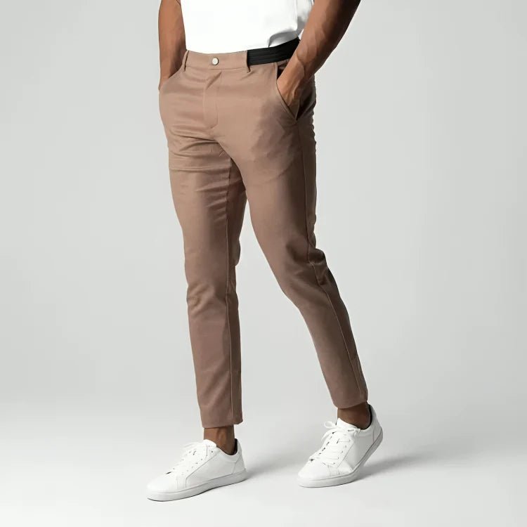 Men's slim fit chino pants with tapered leg design, made from stretch fabric for all-day comfort and style. 7