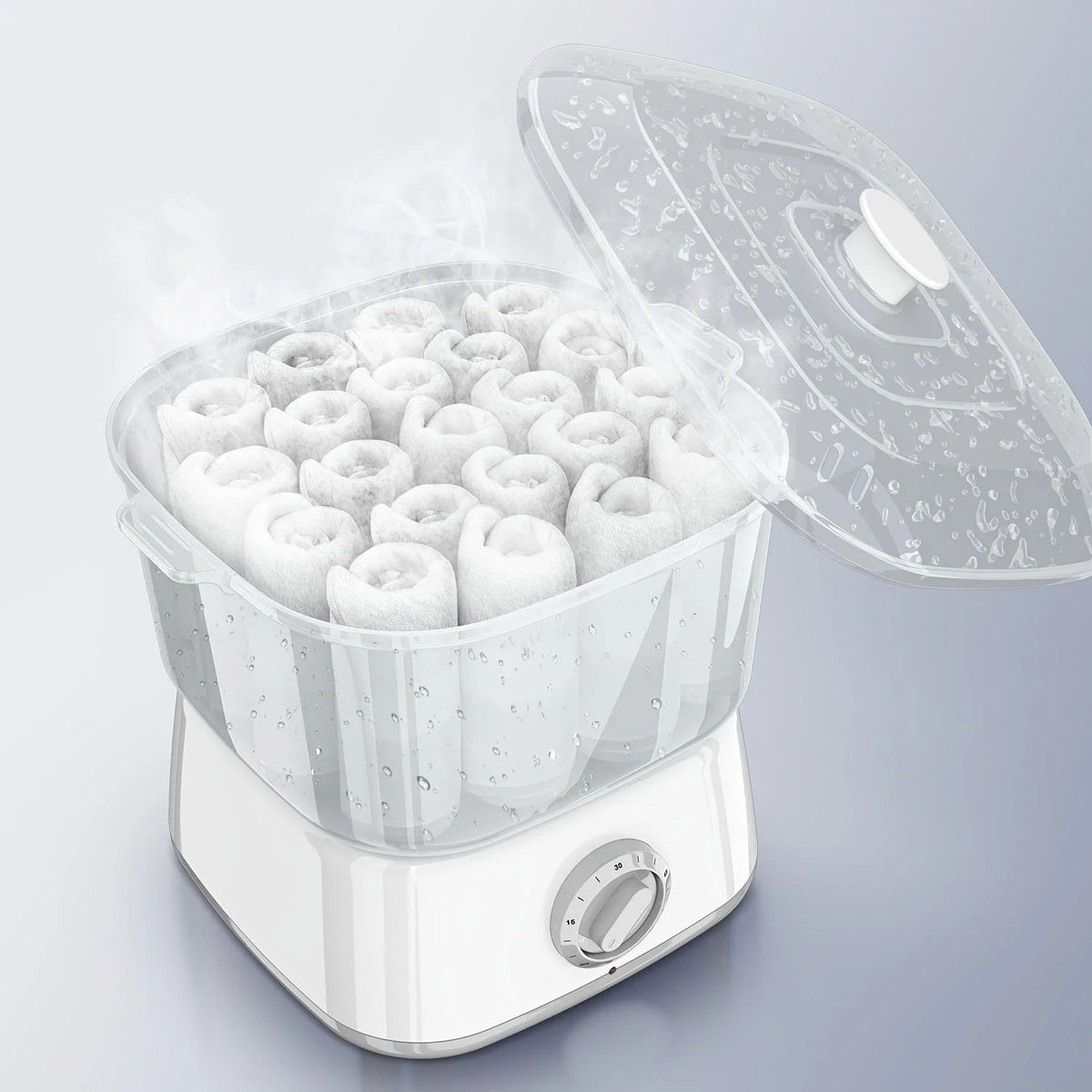 Compact Mini Towel Steamer in Black or White featuring a rotary timer and clear chamber for efficient steaming. 3