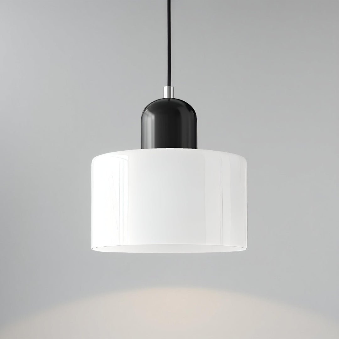Modern pendant light featuring a sleek design with a glass shade, ideal for illuminating kitchen islands and dining areas. 30