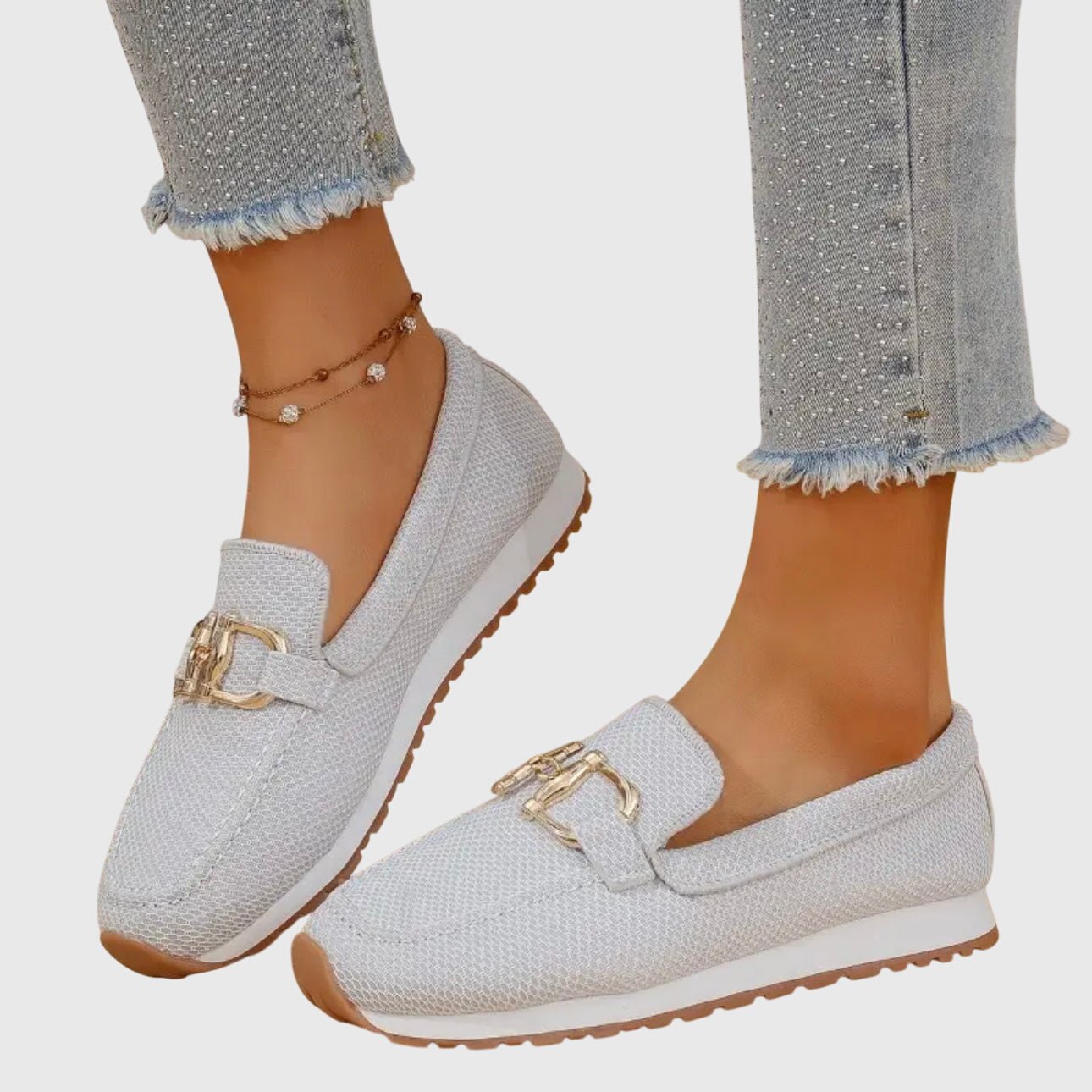 Orthopedic loafers featuring cushioned support and a breathable design, adorned with elegant gold-tone details, perfect for comfort and style. 8