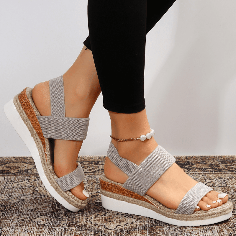 Orthopedic sandals for women featuring elastic straps, designed for comfort with a lightweight breathable platform, ideal for all-day wear. 10