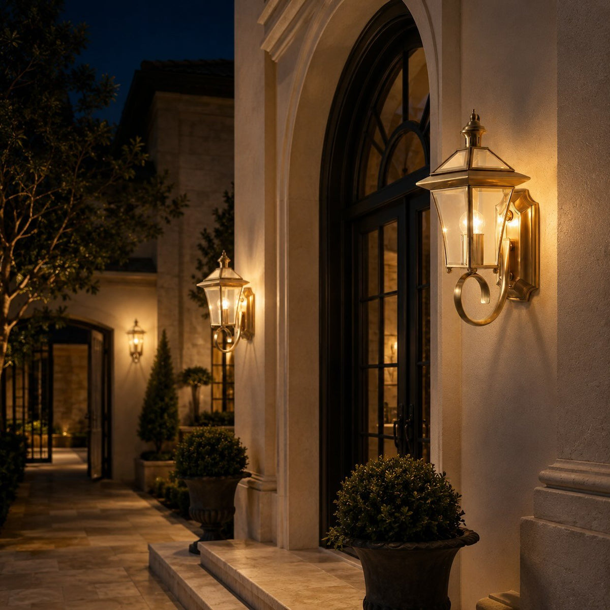 Outdoor wall lantern featuring a weatherproof brass frame and transparent glass shade, designed in a retro style, compatible with E26 LED bulbs. 4