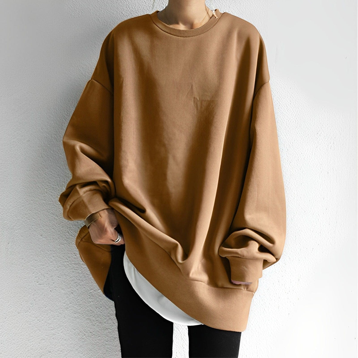 Oversized women's sweatshirt featuring a soft cotton-polyester blend, designed with a minimalist casual aesthetic and relaxed fit for ultimate comfort. 6