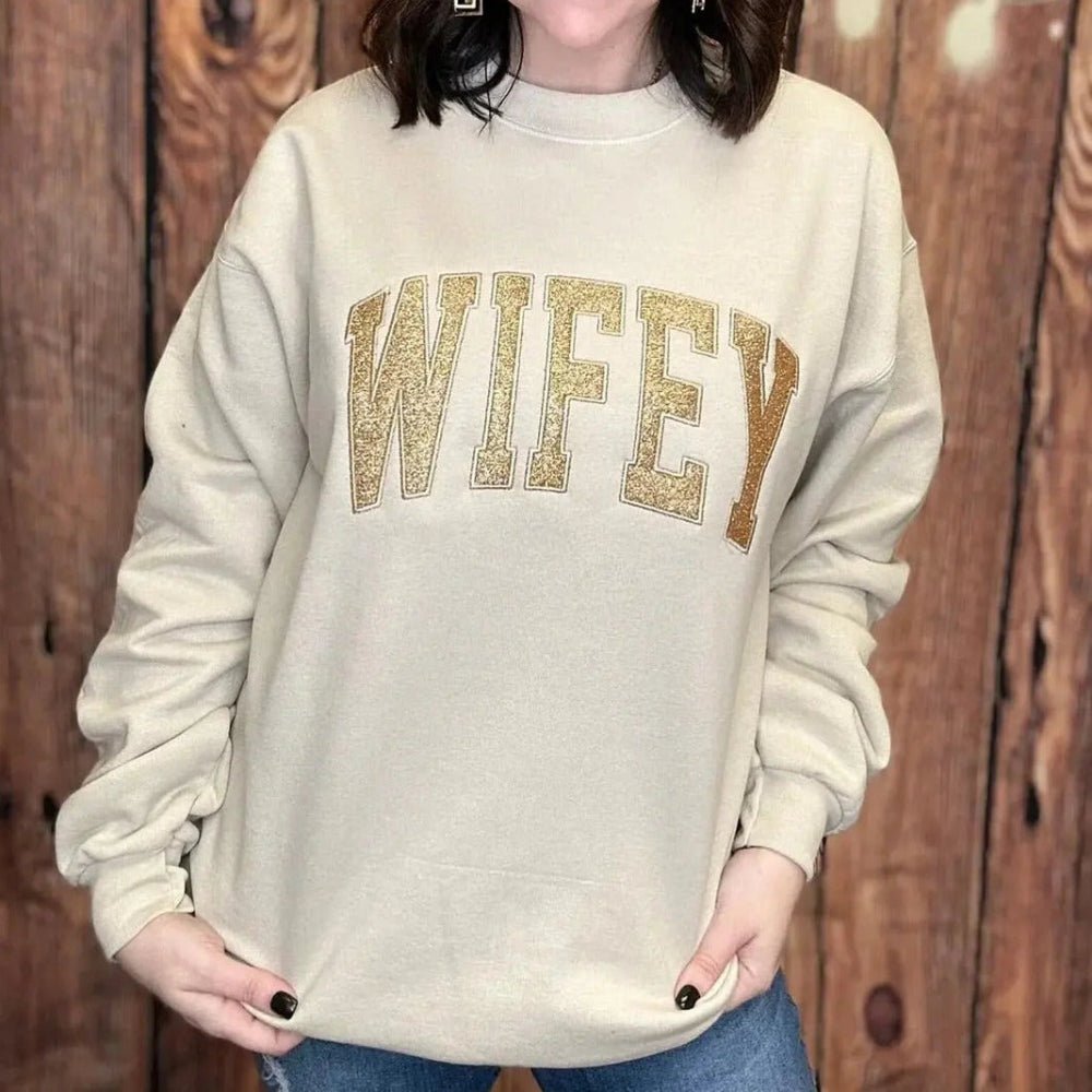 Personalized sweatshirt featuring custom name embroidery and subtle shimmer detail, designed for soft everyday wear. 6