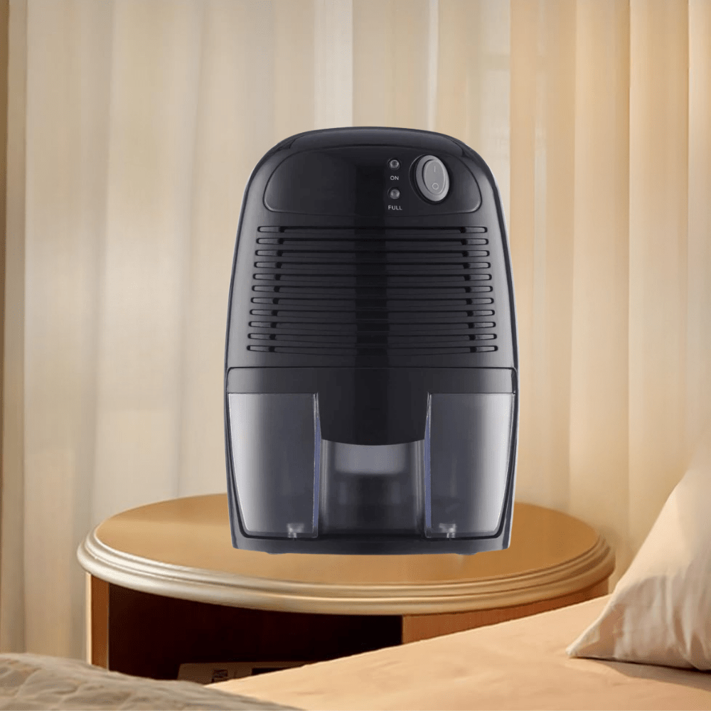 Portable dehumidifier for bedroom in white, designed for quiet operation; compact moisture absorber perfect for small spaces. 3