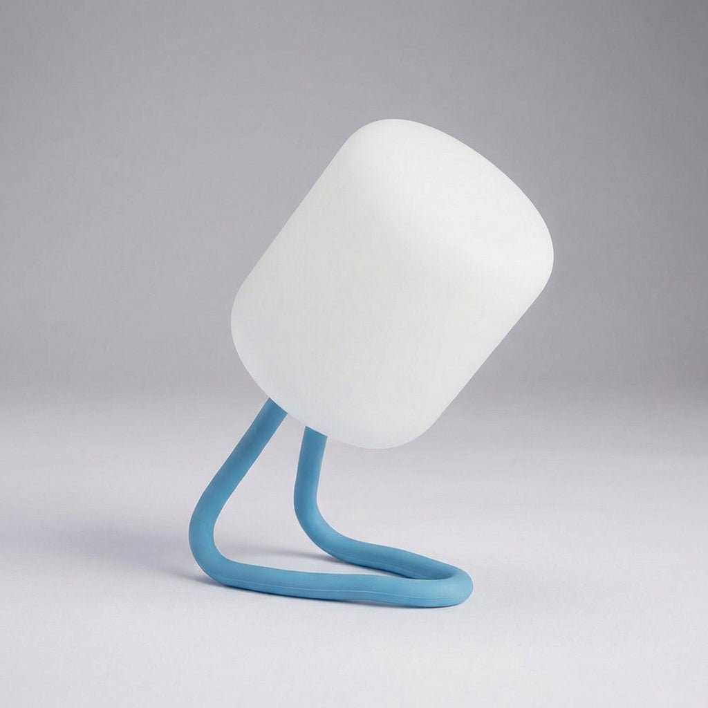 Portable LED night light featuring a soft ambient glow, available in green and blue, designed for battery-powered convenience and compact use. 5