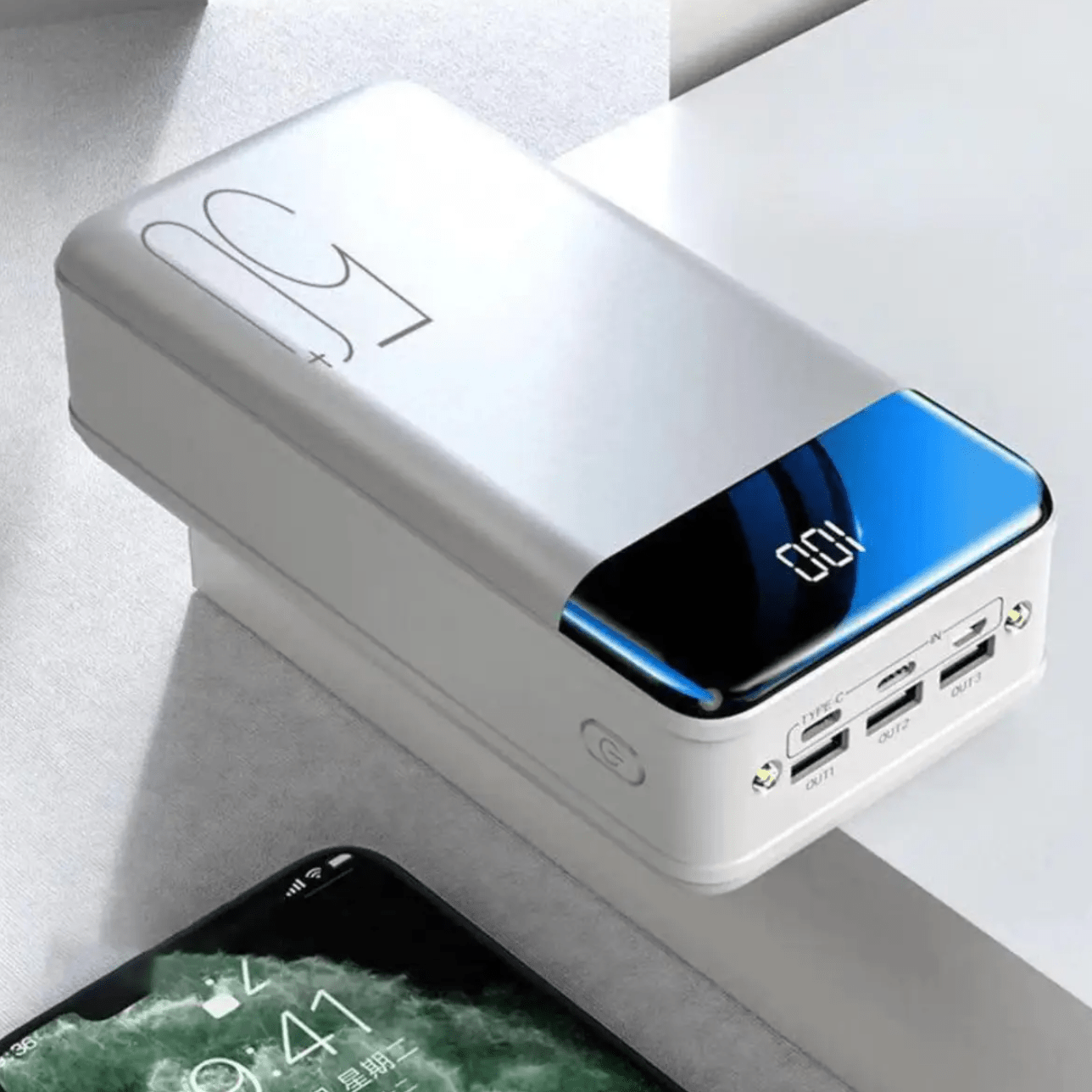Power Bank 50,000mAh with Fast Charging, portable charger for phones, tablets, and laptops, featuring a sleek design and multiple USB ports 5
