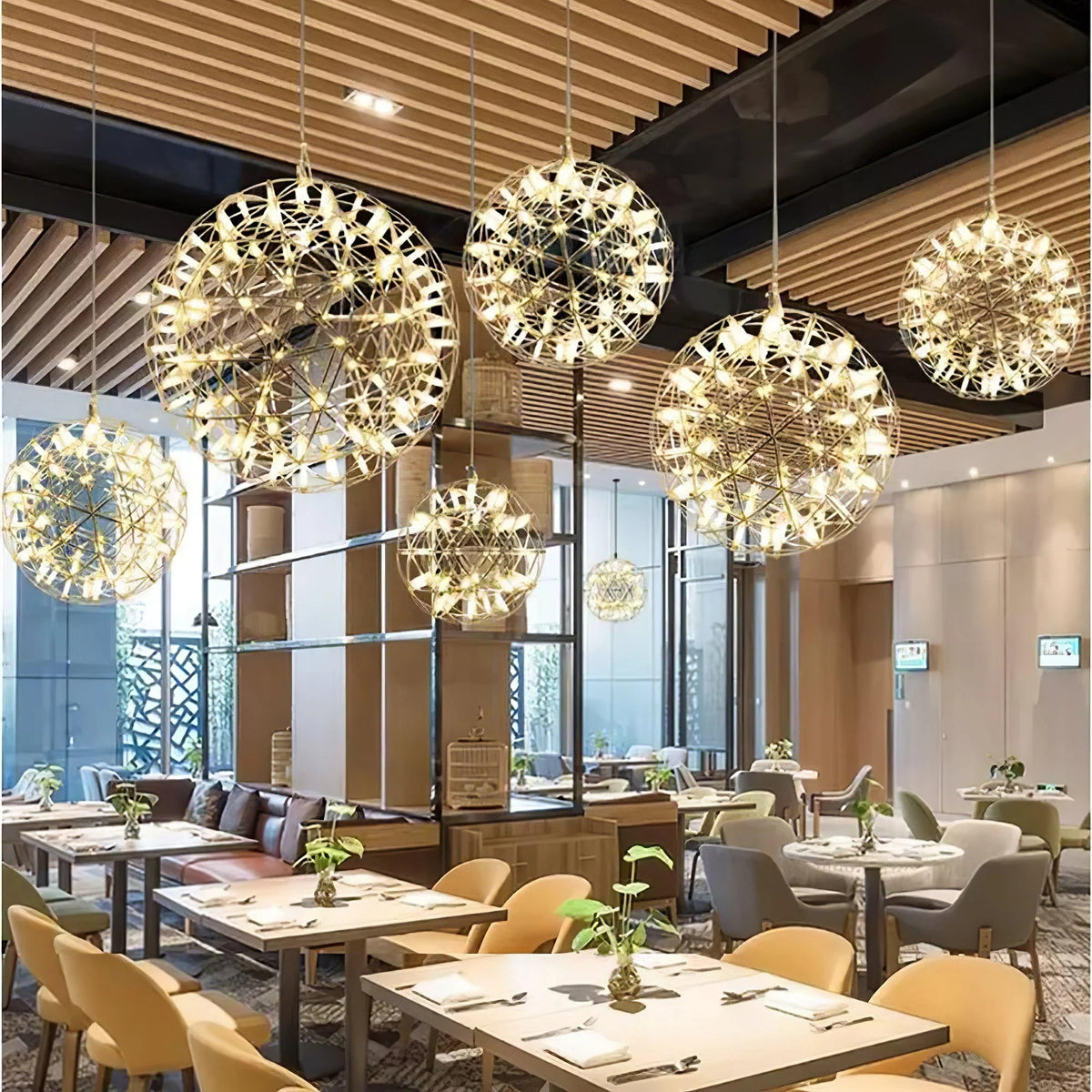 Sculptural pendant light featuring integrated LED technology, adjustable cable, and a sleek modern stainless steel design, perfect for contemporary home decor. 8
