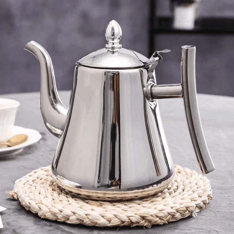 Stainless steel electric kettle with built-in filter and modern induction design, perfect for fast heating and brewing tea or coffee. 5