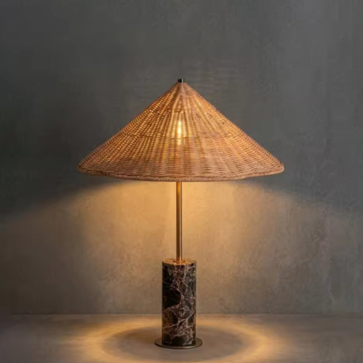 Table lamp featuring a handwoven rattan shade and a sleek marble base, embodying an organic modern design perfect for a bedroom or nightstand. 1