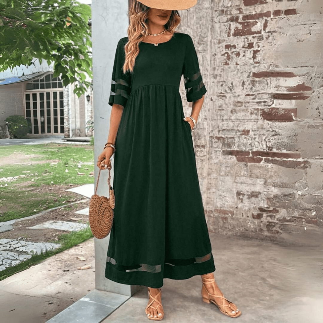 Tummy-smoothing midi dress featuring an empire waist and flowing skirt, designed for women with long sleeves in a classic white color. 5