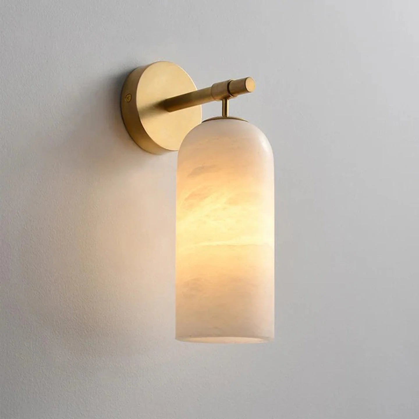 Wall light sconce featuring a stylish alabaster shade and durable metal arm, designed for hardwired indoor ambient lighting to enhance your home decor. 0