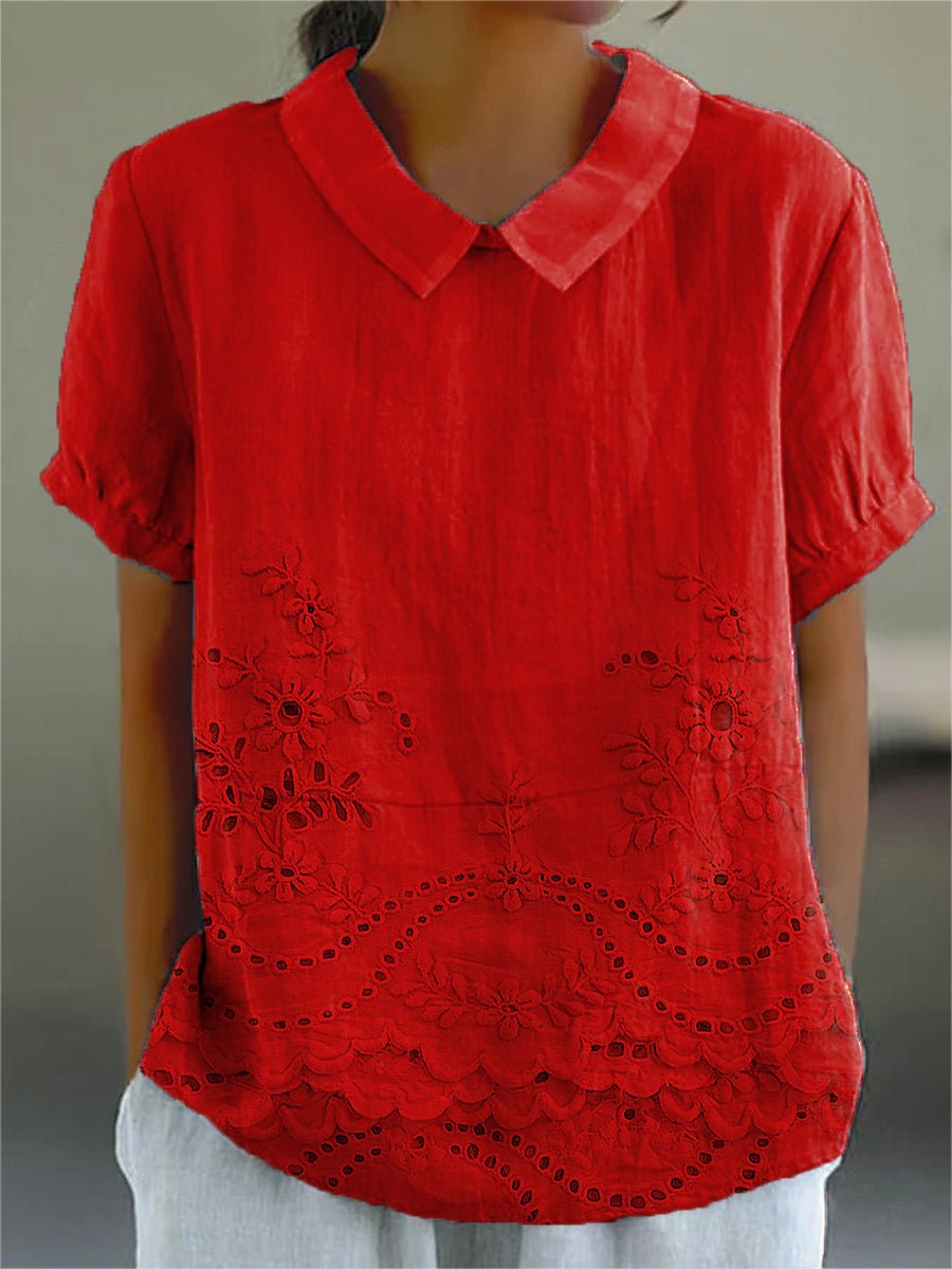Womens blouse featuring delicate floral embroidery in a soft pink cotton linen blend with a relaxed fit. 6
