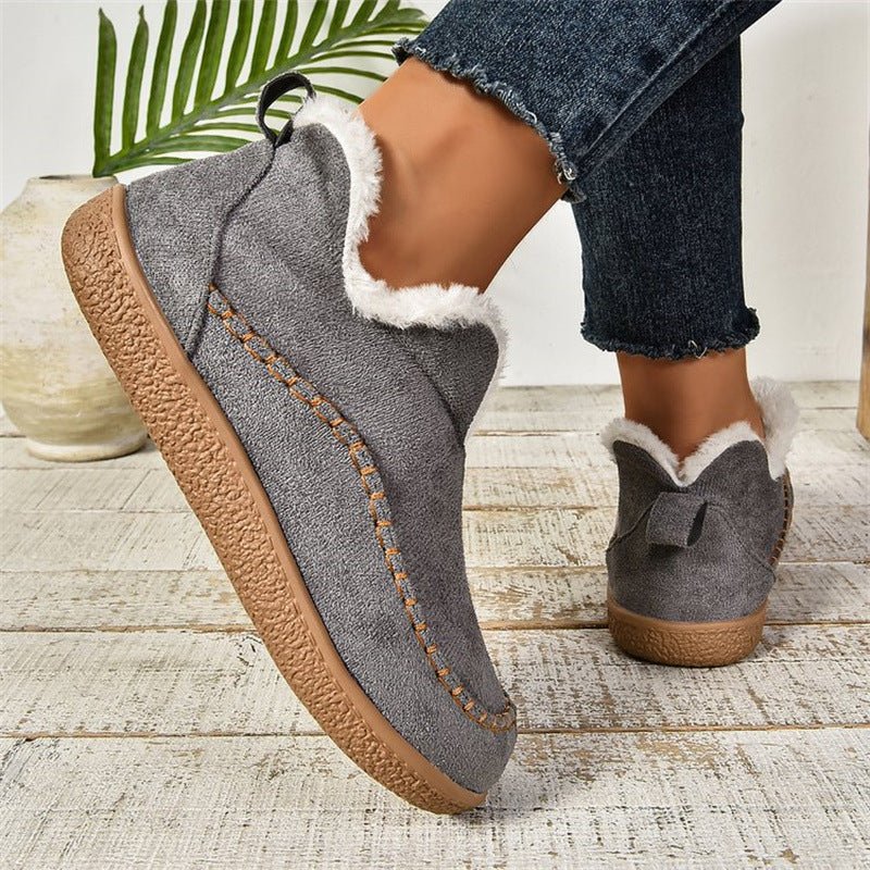 Women's slip-on ankle-high boots featuring a stylish textured sole, perfect for casual everyday wear. 4