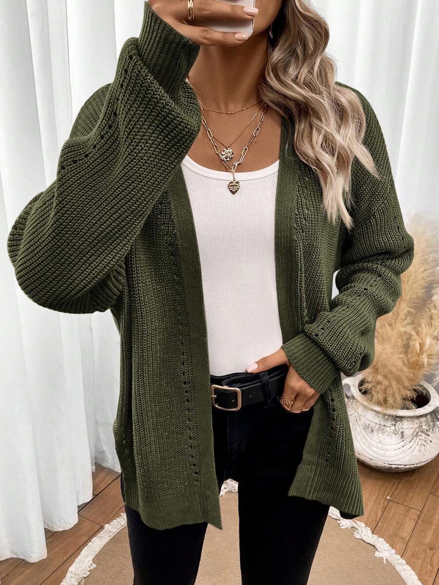 Women's white cardigan featuring pointelle knit design and drop shoulders, perfect for casual layering in any season. 5