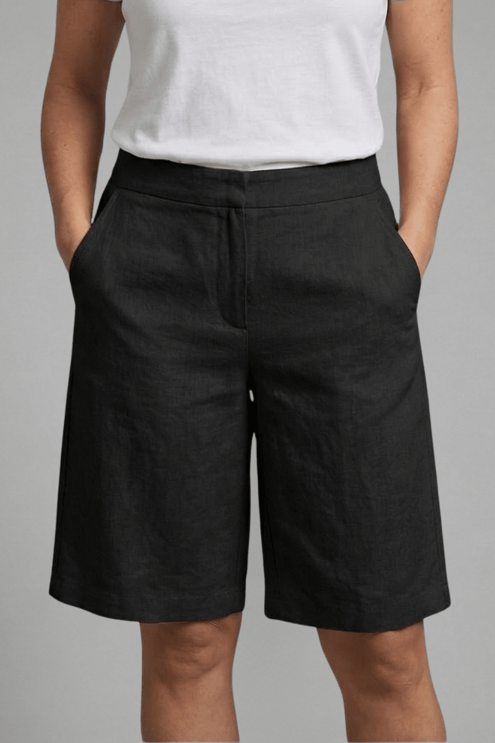 Women's knee-length casual shorts featuring an adjustable waistband and practical pockets, made from comfortable lightweight fabric perfect for warm weather. 8