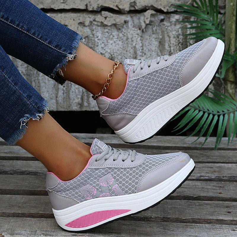 Women's sneakers featuring arch support and breathable fabric, designed for comfort and durability, perfect for walking and everyday wear. 8