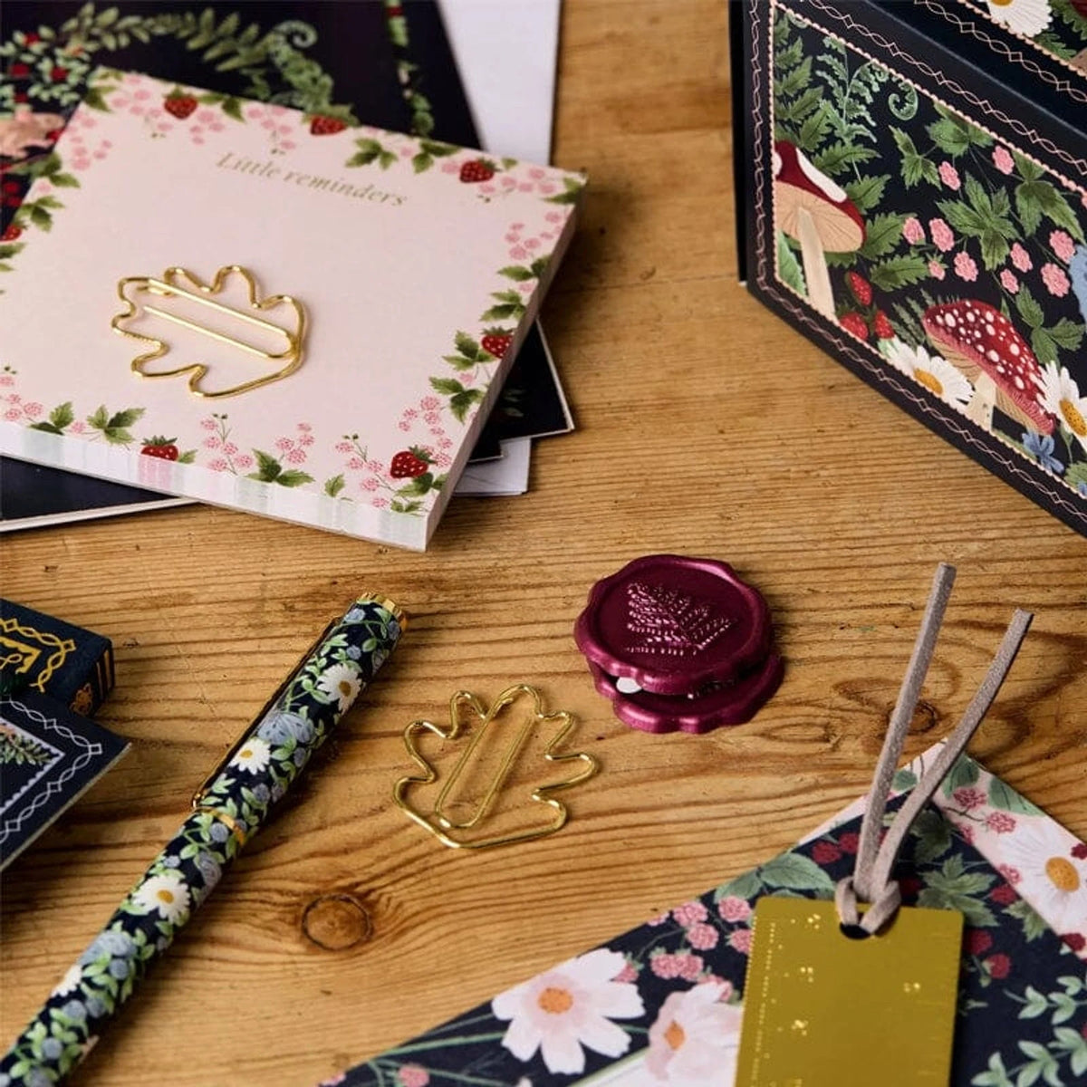 24-Day Stationery Advent Calendar featuring a charming woodland design in berry hues, crafted with eco-friendly packaging and includes reusable boxes for sustainable gifting. 3