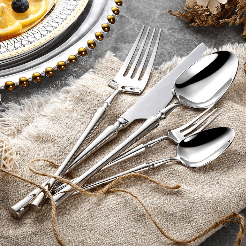 24-piece stainless steel cutlery set featuring elegant design and durable construction, perfect for enhancing dining experiences at any occasion. 0