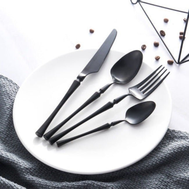 24-piece stainless steel cutlery set featuring elegant design and durable construction, perfect for enhancing dining experiences at any occasion. 1