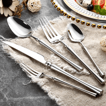 24-piece stainless steel cutlery set featuring elegant design and durable construction, perfect for enhancing dining experiences at any occasion. 6