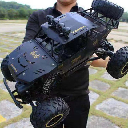 4x4 RC offroad car with rechargeable battery, designed for durability and performance on all terrains, featuring a robust remote control system for thrilling outdoor adventures 1
