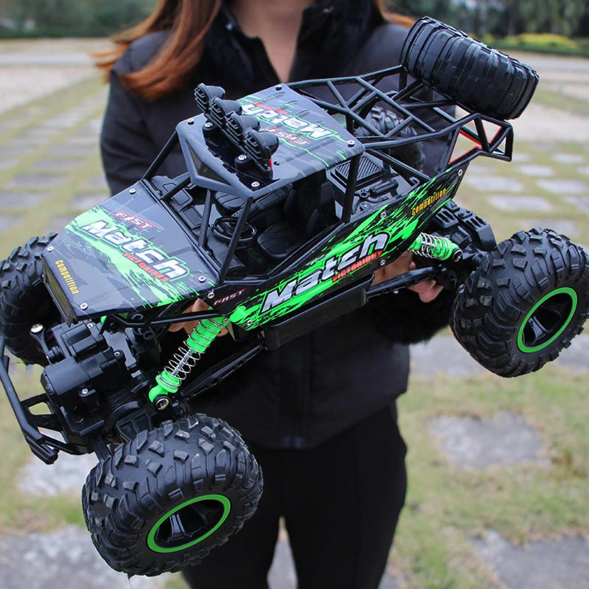 4x4 RC offroad car with rechargeable battery, designed for durability and performance on all terrains, featuring a robust remote control system for thrilling outdoor adventures 5