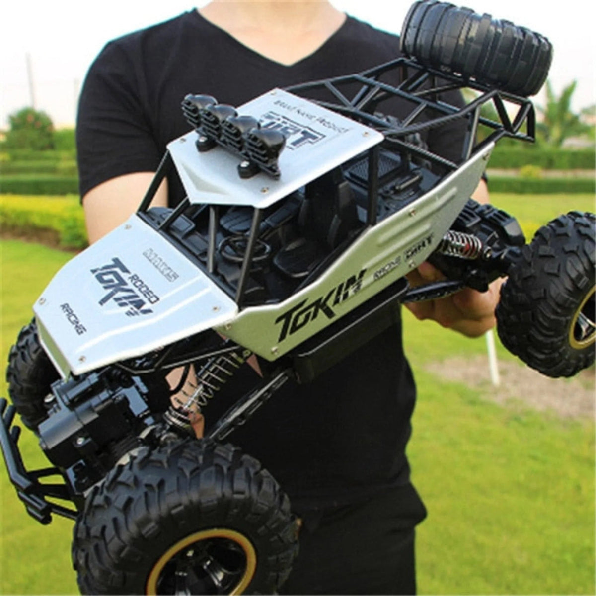 4x4 RC offroad car with rechargeable battery, designed for durability and performance on all terrains, featuring a robust remote control system for thrilling outdoor adventures 3