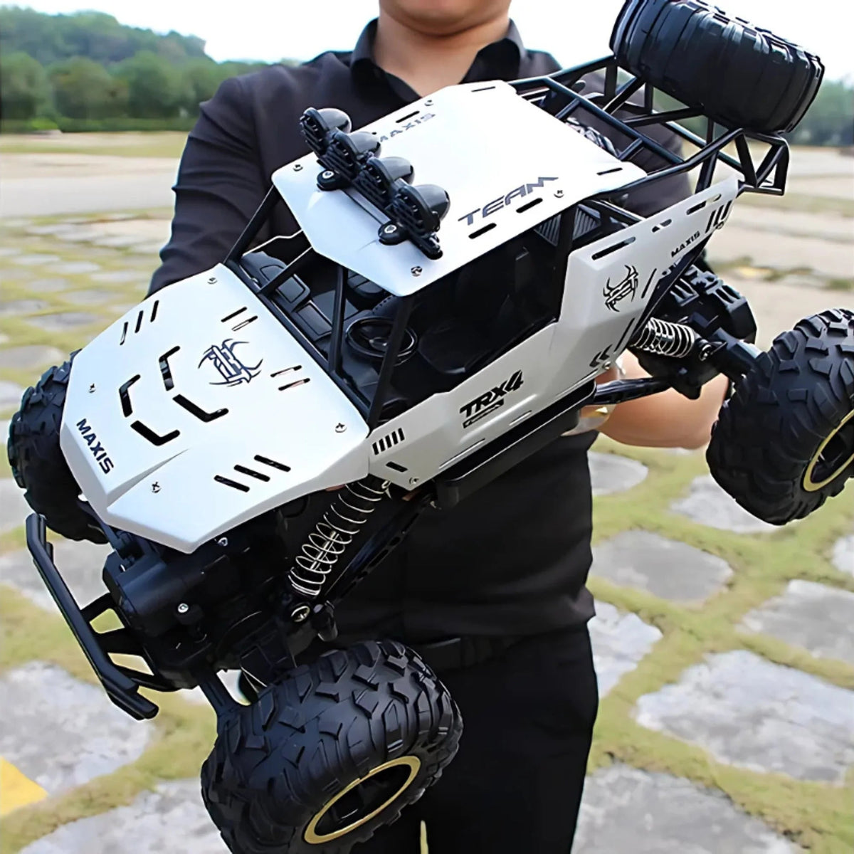 4x4 RC offroad car with rechargeable battery, designed for durability and performance on all terrains, featuring a robust remote control system for thrilling outdoor adventures 4