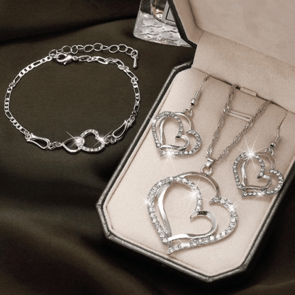 925 Sterling Silver Jewelry Set featuring a Double Heart Design, includes a matching necklace, earrings, and an adjustable bracelet. 0