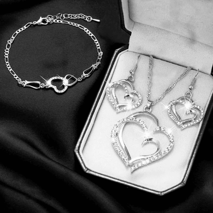 925 Sterling Silver Jewelry Set featuring a Double Heart Design, includes a matching necklace, earrings, and an adjustable bracelet. 3