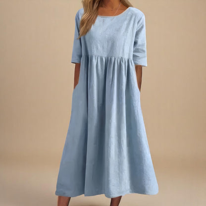 A-line dress for women featuring discreet pockets and made from soft fabric, perfect for everyday comfort and style. 0