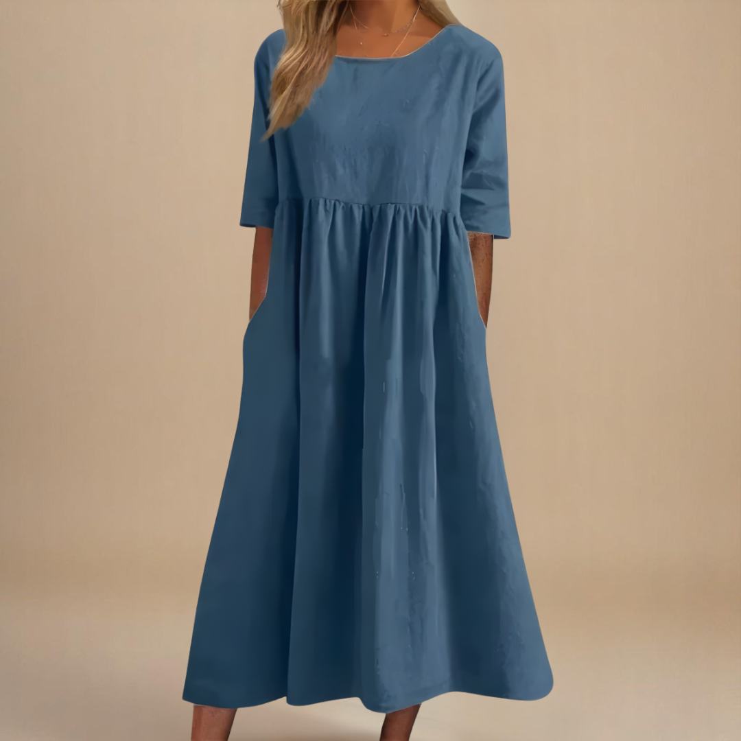 A-line dress for women featuring discreet pockets and made from soft fabric, perfect for everyday comfort and style. 1