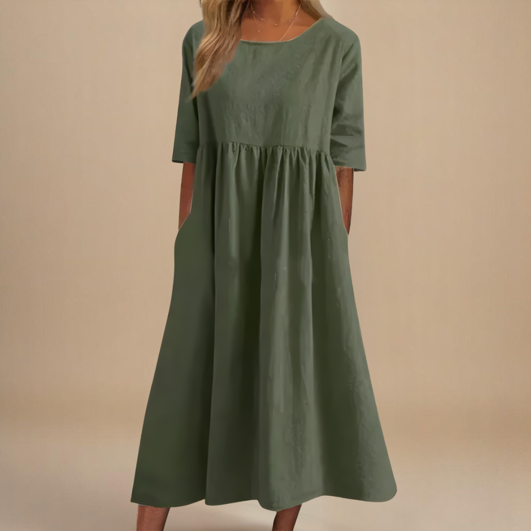 A-line dress for women featuring discreet pockets and made from soft fabric, perfect for everyday comfort and style. 2