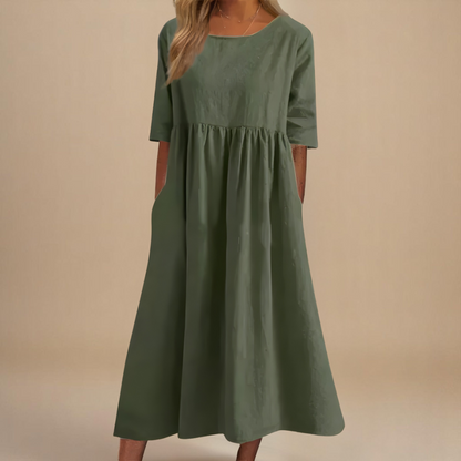 A-line dress for women featuring discreet pockets and made from soft fabric, perfect for everyday comfort and style. 2