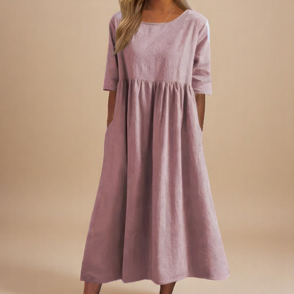 A-line dress for women featuring discreet pockets and made from soft fabric, perfect for everyday comfort and style. 3