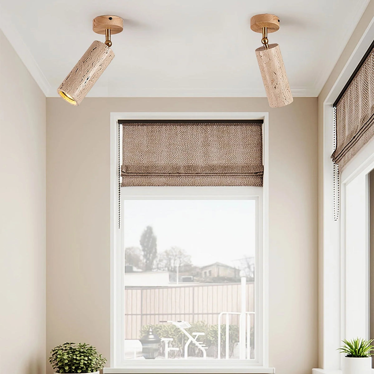 Adjustable ceiling light featuring a travertine shade and brass pivot, showcasing a compact modern design ideal for indoor accent lighting. 2