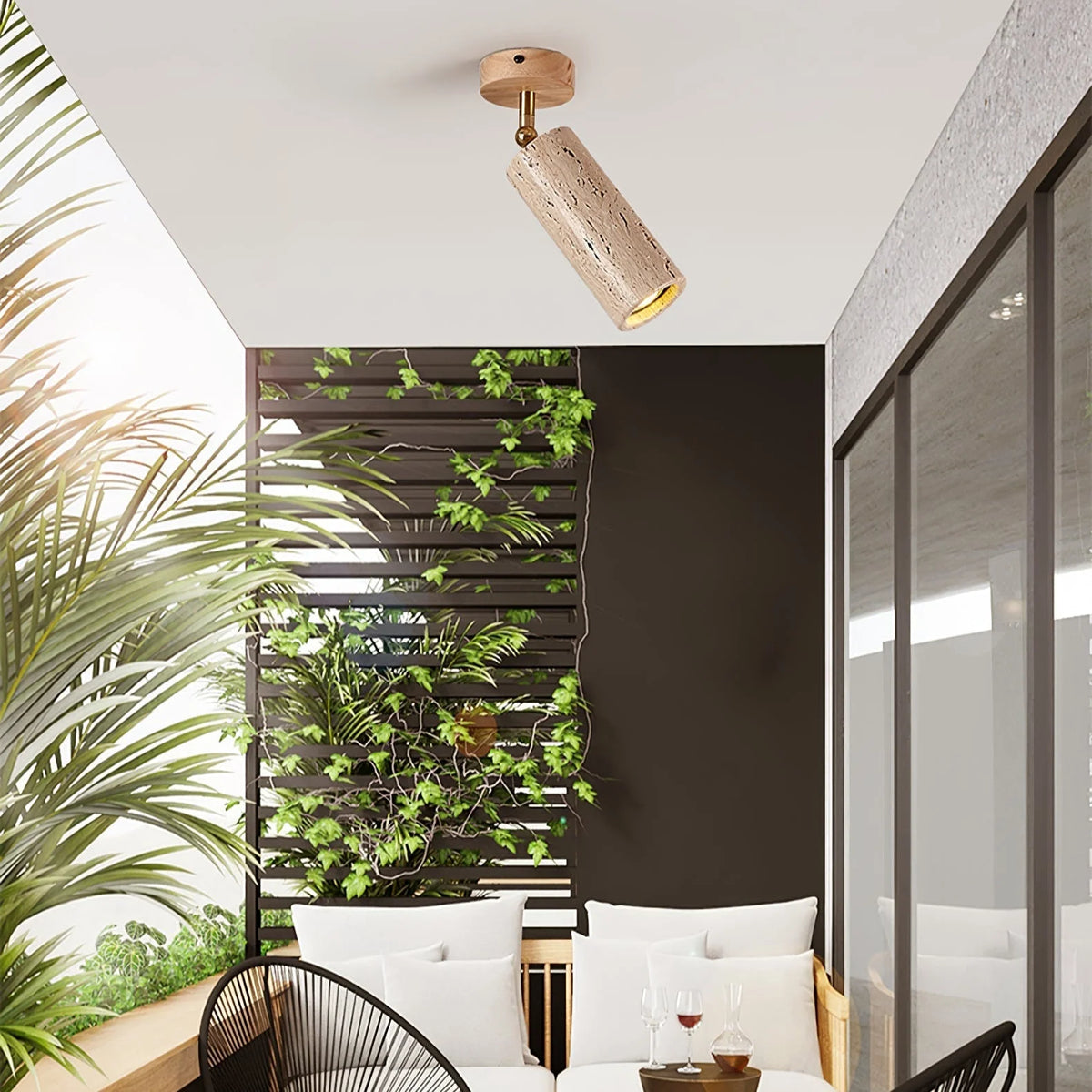 Adjustable ceiling light featuring a travertine shade and brass pivot, showcasing a compact modern design ideal for indoor accent lighting. 4
