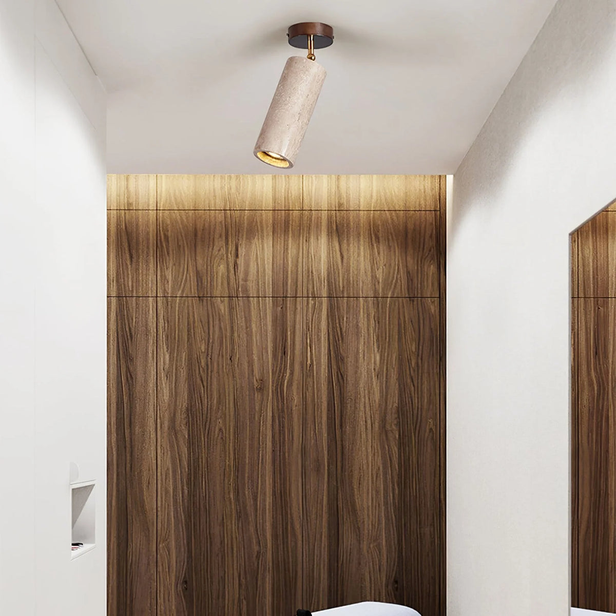 Adjustable ceiling light featuring a travertine shade and brass pivot, showcasing a compact modern design ideal for indoor accent lighting. 5