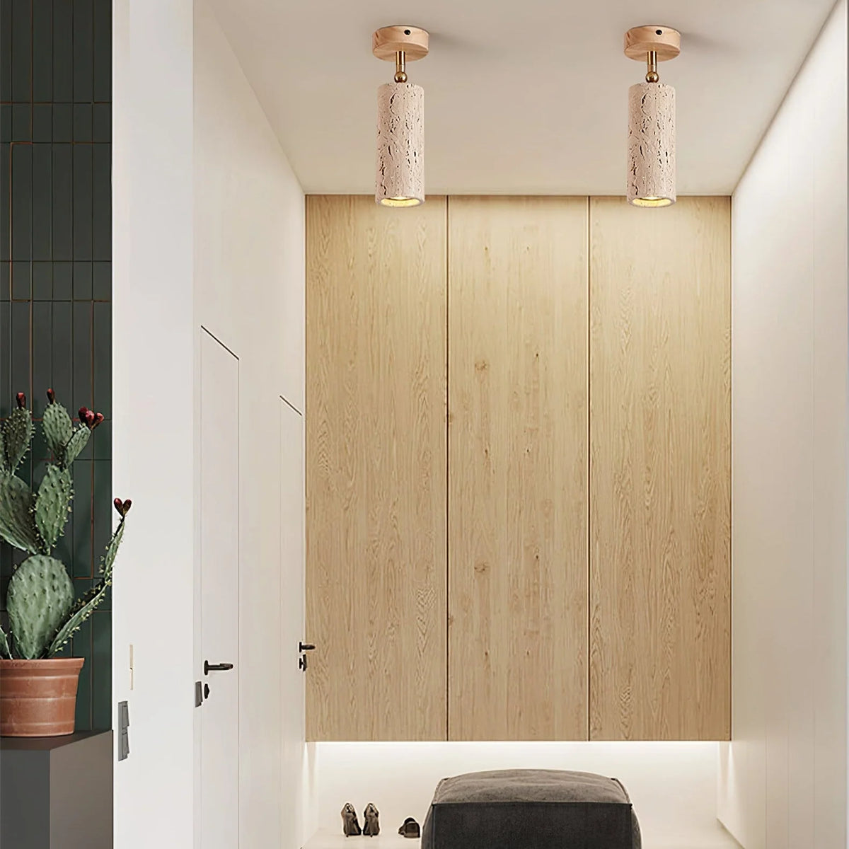Adjustable ceiling light featuring a travertine shade and brass pivot, showcasing a compact modern design ideal for indoor accent lighting. 7